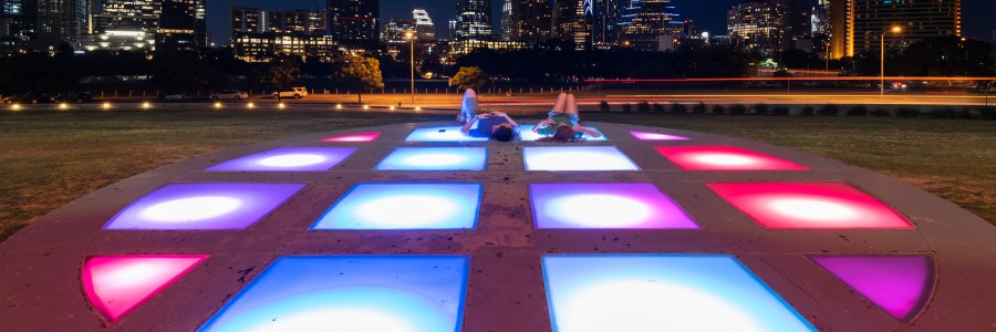 Colored lights at the Long Center in Austin Texas downtown at night