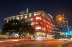 Austin Central Library in Austin Texas at night in orange