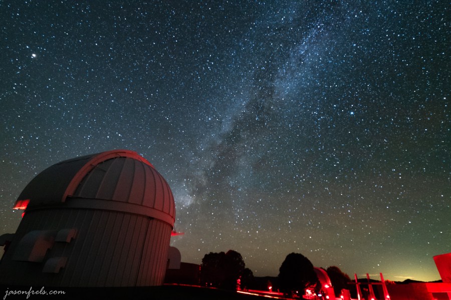 Milky Way over telescopes at the McDonald Observatory in Texas