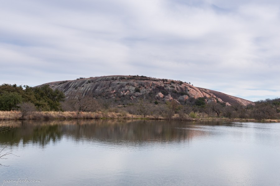 Enchanted Rock reflected in Moss Lake